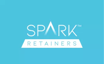 Spark Retainers logo displayed on a bright blue background.