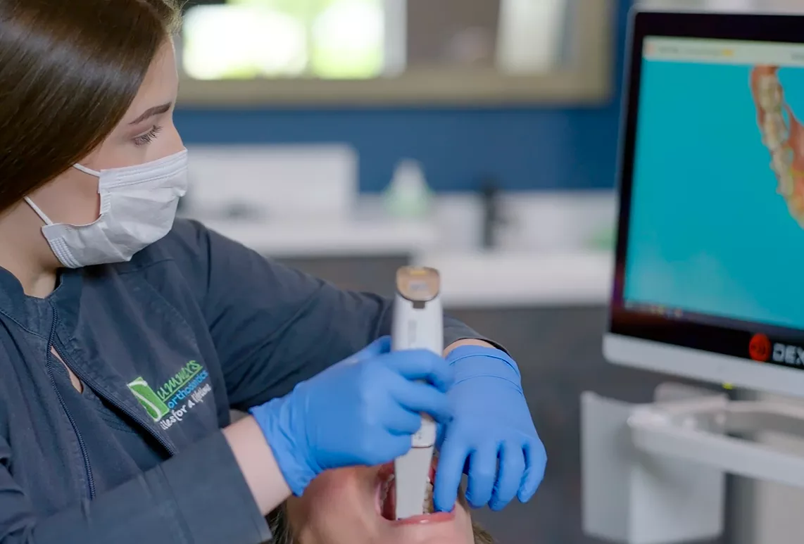 Dexis Spark scanner with Orthodontist and patient