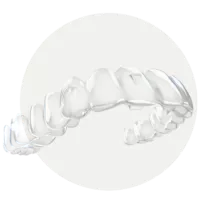 Transparent clear aligner shaped to fit a dental arch, shown as a standalone orthodontic appliance
